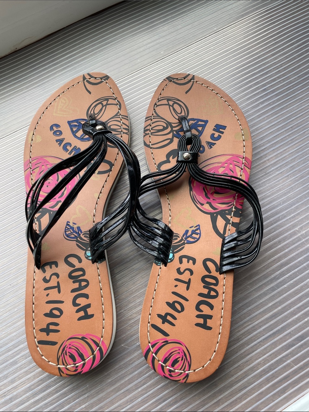 COACH Black Strappy Sandals with Pink Floral Footbed